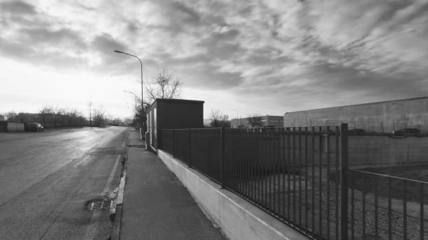Road in a industrial area, black and white