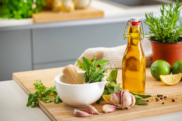 istock Fresh culinary herbs, olive oil and garlic 1480752907