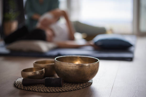 Close-up on Tibetan singing bowls in Shiatsu massage studio