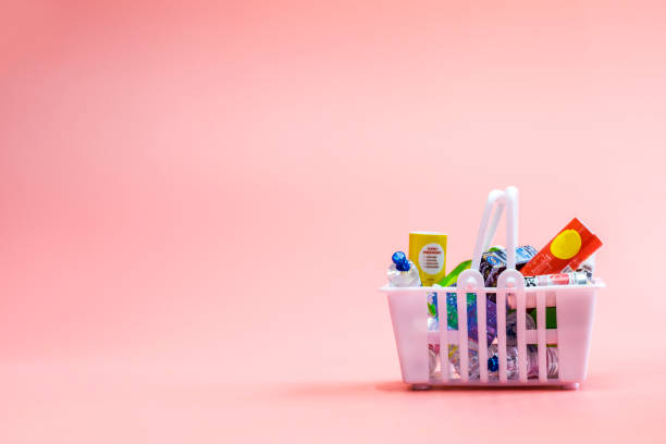 Full shopping basket, food and groceries in shopping basket on pink background, copy space Full shopping basket, food and groceries in shopping basket on pink background, copy space space for text Global Supplement Market stock pictures, royalty-free photos & images