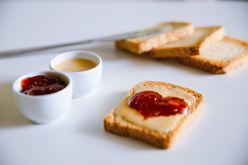 Peanut butter and jelly served in heart shape