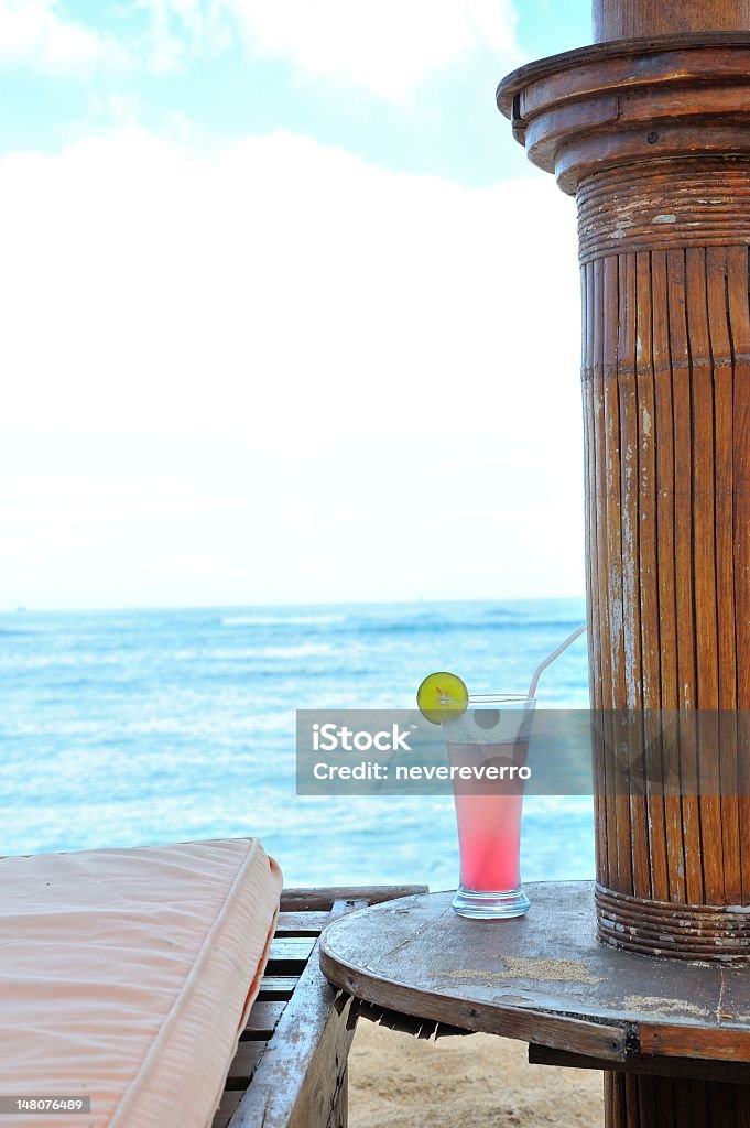 Pink Juice Cocktail on Deck Alcohol - Drink Stock Photo