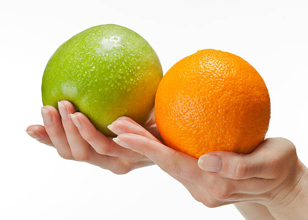 istock Human hands holding fresh fruits 148076490