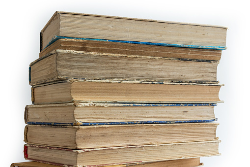 Stack of books on white background. Conceptual background of learning, education, science or x literature.