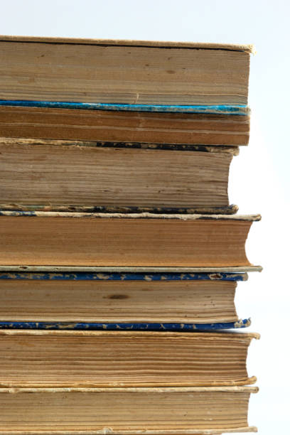 istock Stack of books on white background. Conceptual background of learning, education, science or x literature 1480771977
