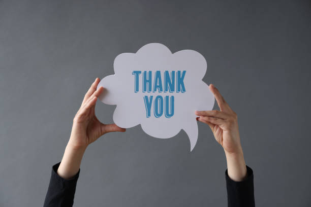 Thank you writes on the chat bubble. stock photo