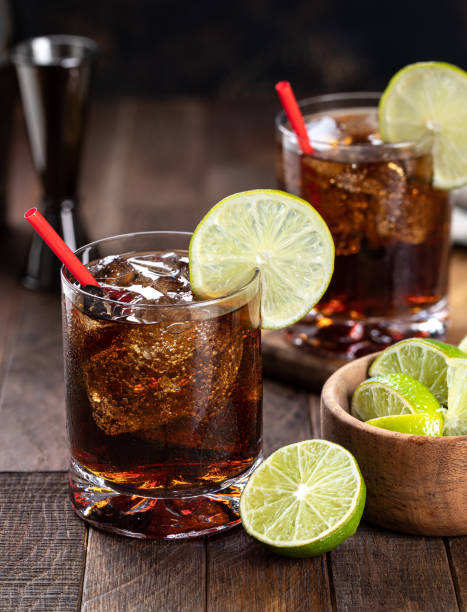 istock Rum and cola cocktail with lime slice 1480775213