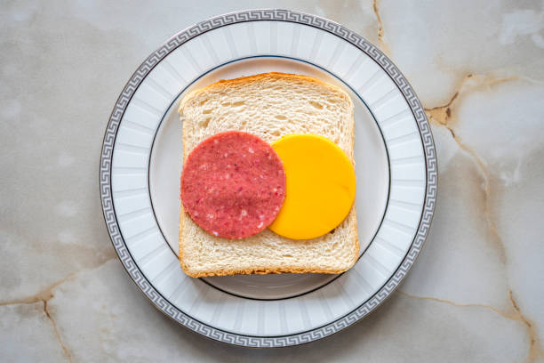 Salami and cheddar cheese on bread