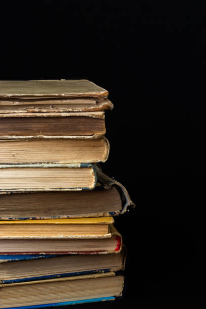 istock Stack of hardcover old books with on a dark background. Bookshelf shop, Knowledge publications, literature. Bookish bookstore bookstore 1480788103