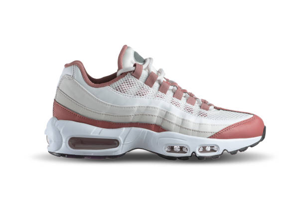 istock White sneaker shoe with raspberry, red accent color on a isolated white background , men's fashion, sport shoe, air, sneakers, lifestyle, concept, product photo, levitation concept, street wear, trainers 1480789347