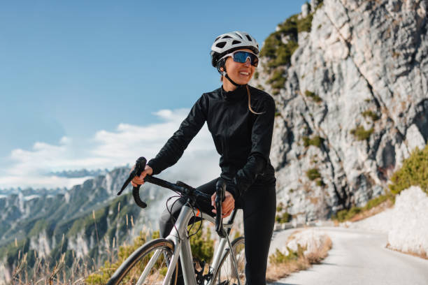 istock Confident Female Cyclist in Mountainous Scenery 1480789635