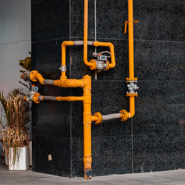 istock Yellow pipes on the wall 1480790846