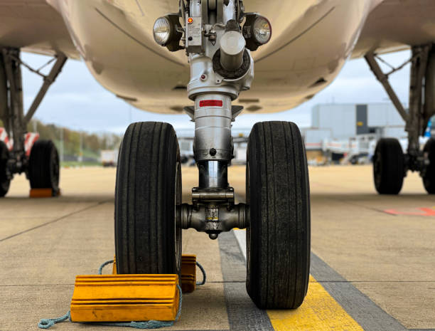 istock Airliner nose landing gear close up 1480794438