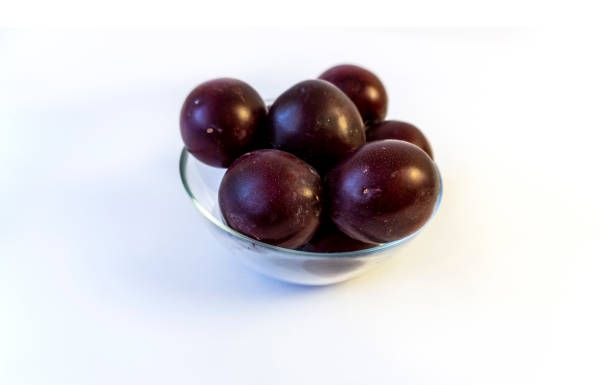 istock photo of plum on a plate, isolate 1480795075