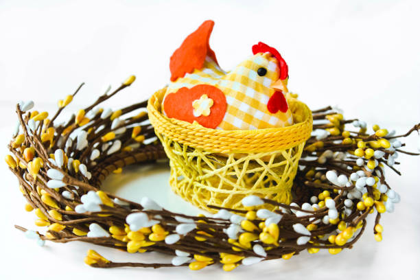 Easter decoration with three funny yellow chicks isolated on white background. Easter holiday concept.