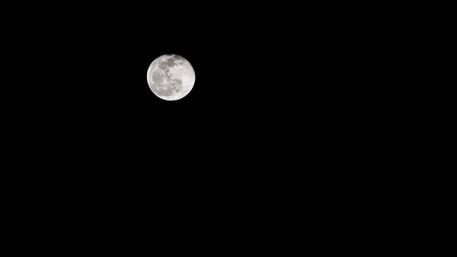 Time Lapse of April Full moon in the night sky