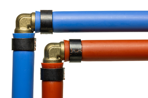 Blue and red (cold and hot) pex water pipe.