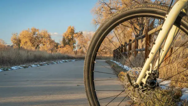 touring bicycle on a bike trail in late fall scenery - Poudre River Trail in northern Colorado