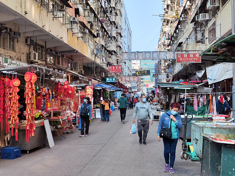 People at a busy street market in Ki Lung street, Sham Shui Po district, Kowloon Peninsula.