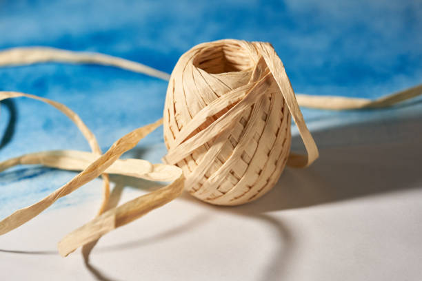 istock Paper gift ribbon on blue background. 1480823357