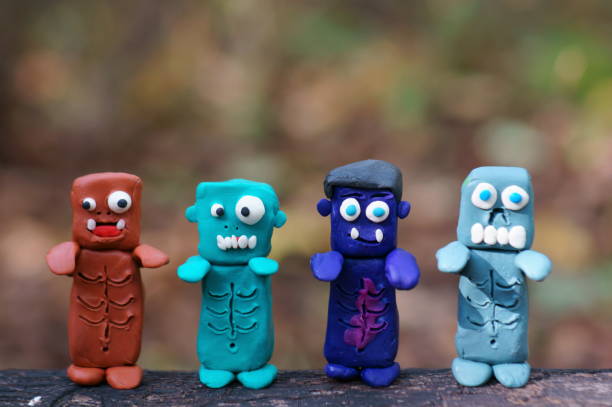 istock Funny monsters made of plasticine. 1480826678