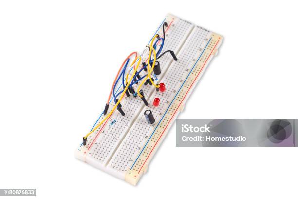 Breadboard With Electrical Elements On White Background Stock Photo - Download Image Now