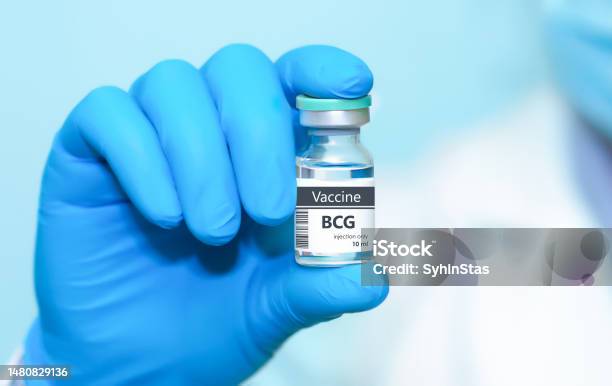 Doctor In Protective Gloves Holding A Bcg Vaccine Kids Vaccine The Concept Of Medicine Healthcare Science And Vaccination Awareness Stock Photo - Download Image Now