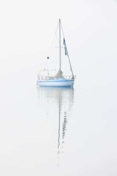 istock Sailboat In Fog Navarre Florida 1480838502