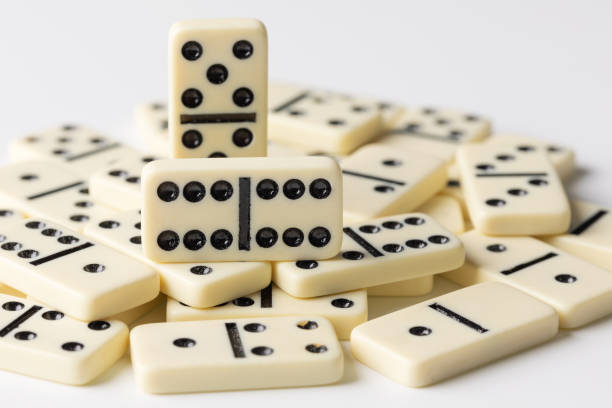 istock beige domino tiles on a white background 1480842080