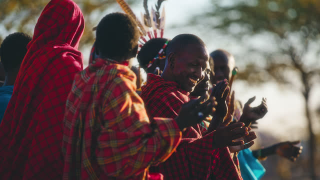 SLO MO Samburu men in local dresses performs tribal songs