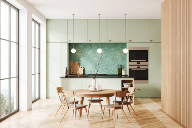 istock Stylish kitchen interior with dining and cooking zone, bar island and window 1480851414