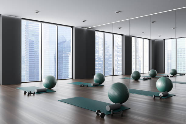 istock Grey gym interior with sport equipment, mirror and panoramic window 1480852385