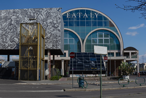 Ostiense, Rome, Italy April 8, 2023: Exterior of the Eataly building, opened in 2012 in the former air terminal near the Ostiense train station