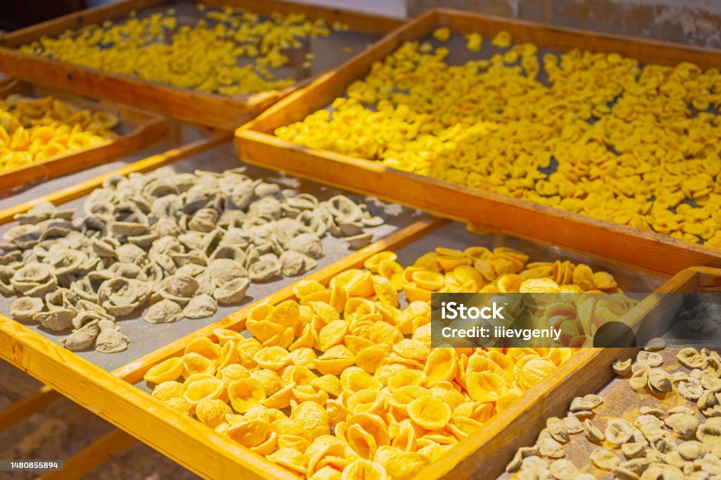 Raw homemade conchiglie pasta on street in Italy. Traditional food. Bari. Bari. Italy Italy Stock Photo