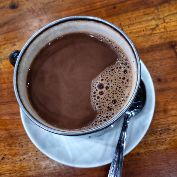 istock hot chocolate at table and little spoon 1480860599