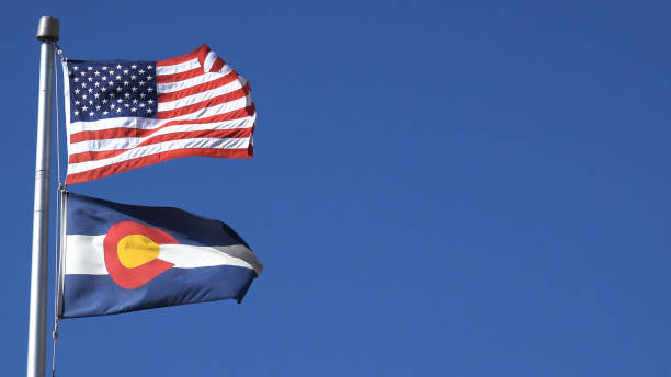 istock American and Colorado State Flag Long Shot 1480869978