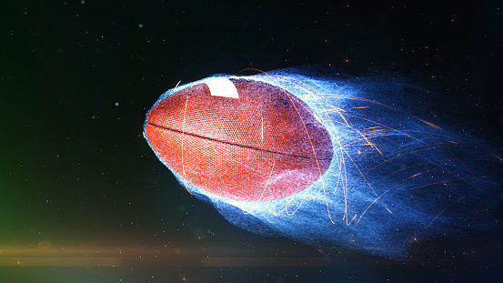 Football Flying in Flames features a football flying through a space like atmosphere with blue particle flames emanating from it.