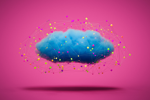 Abstract 3D image illustrates the concept of cloud computing, showcasing a floating blue cloud surrounded by interconnected colorful boxes against a vibrant pink background. 
The vibrant composition highlights the seamless integration of various components in a cloud-based environment, emphasizing the power of collaboration and innovation in the digital environment.