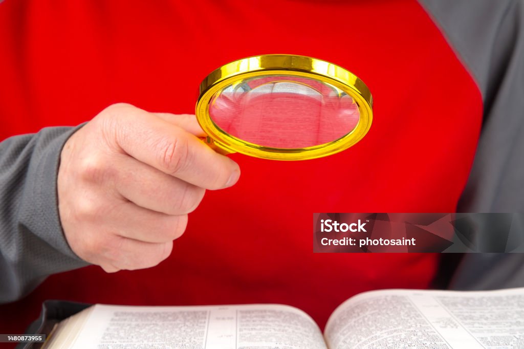 Magnifying Glass For Reading A Book Open Bible The Study Of Literature  Stock Photo - Download Image Now - iStock