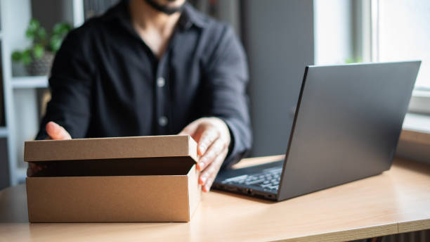 istock Close-up Young entrepreneur with small business preparing order 1480874842