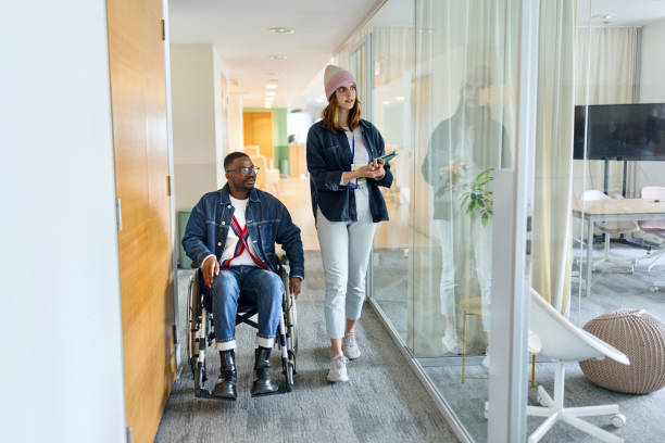 istock Person with disabilities working in a modern company 1480875464
