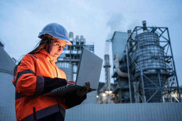 istock Woman engineer working in power plant, night shift. 1480878784