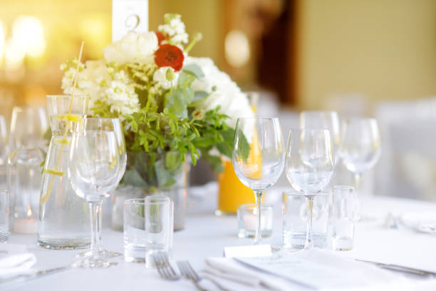 istock Beautiful table setting with crockery and flowers for a party, wedding reception or other festive event 1480883128