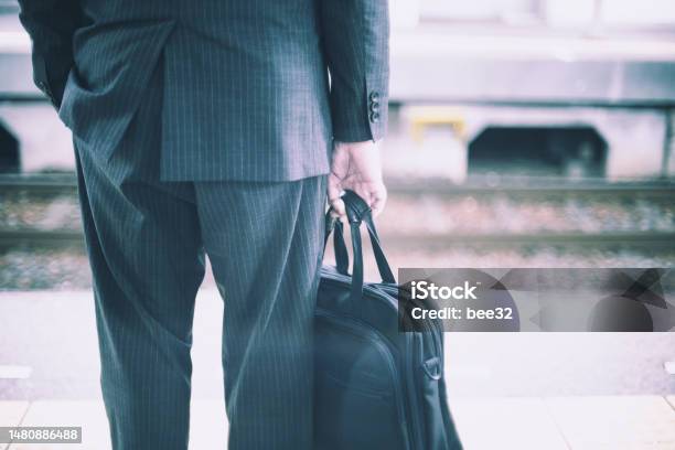 Businessman Back View With Bag Stock Photo - Download Image Now - At The Edge Of, Bag, Blank