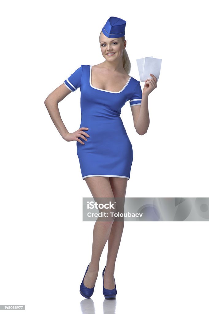 hostess aria con due biglietti per il volo - Foto stock royalty-free di Assistente di volo