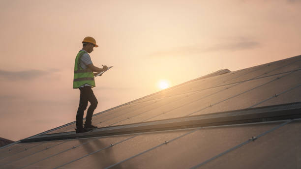 istock Service engineer checking solar cell on the roof for maintenance if there is a damaged part. Engineer worker install solar panel. Clean energy concept. 1480890340