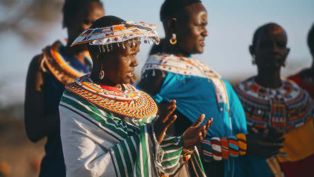SLO MO Samburu women in local dresses performs tribal songs