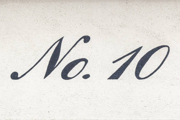 10 number decorative font handpainted on house wall.