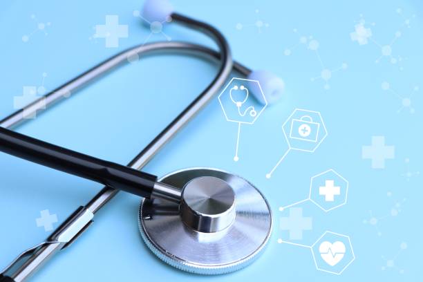 istock stethoscope on blue background and symbol 1480899051