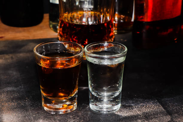 istock red strong alcohol drinks, spirits and distillates iset in glasses 1480899167
